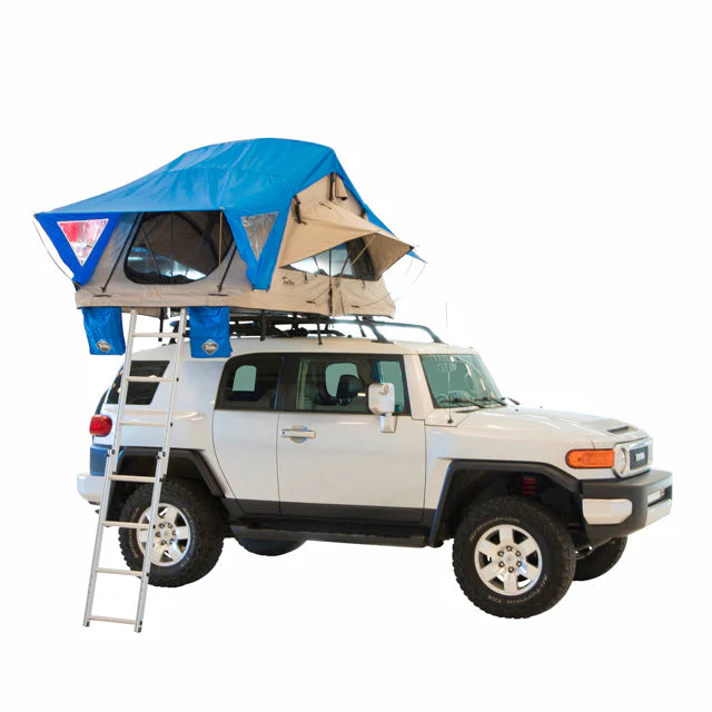 Blue rooftop tent on vehicle, ladder extended for rooftop access