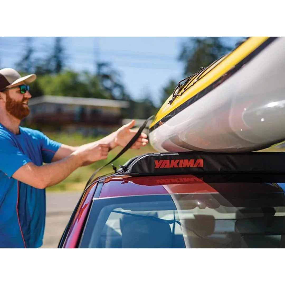 man fixing kayak to Yakima EasyTop Temporary Roof Rack
