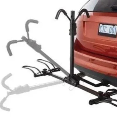 Angled rear view of CCM platform bike rack installed on SUV, showing wheel trays and vertical support