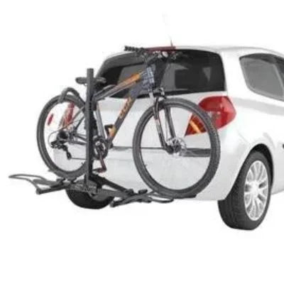 CCM 2-Bike Platform Carrier attached to white SUV, carrying two adult bicycles