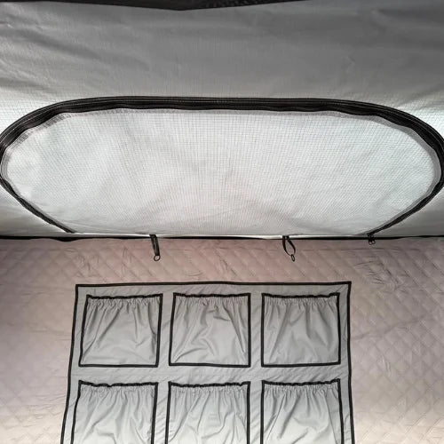 rooftop tent skylight window with storage compartments