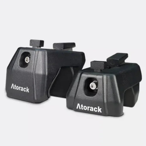 Two black Atorack camera accessories on a light gray background