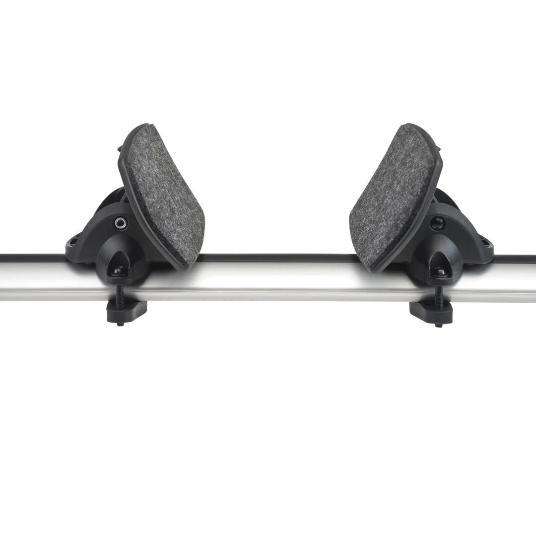 Top-down view of Rhino-Rack Nautic 571 rear cradles mounted on crossbars for rear-loading kayak support.