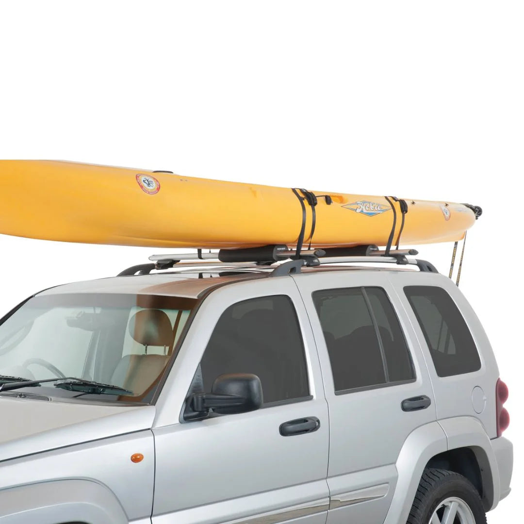 Yellow kayak secured on SUV roof with Rhino-Rack Vortex Foam Wrap Pads protecting crossbars