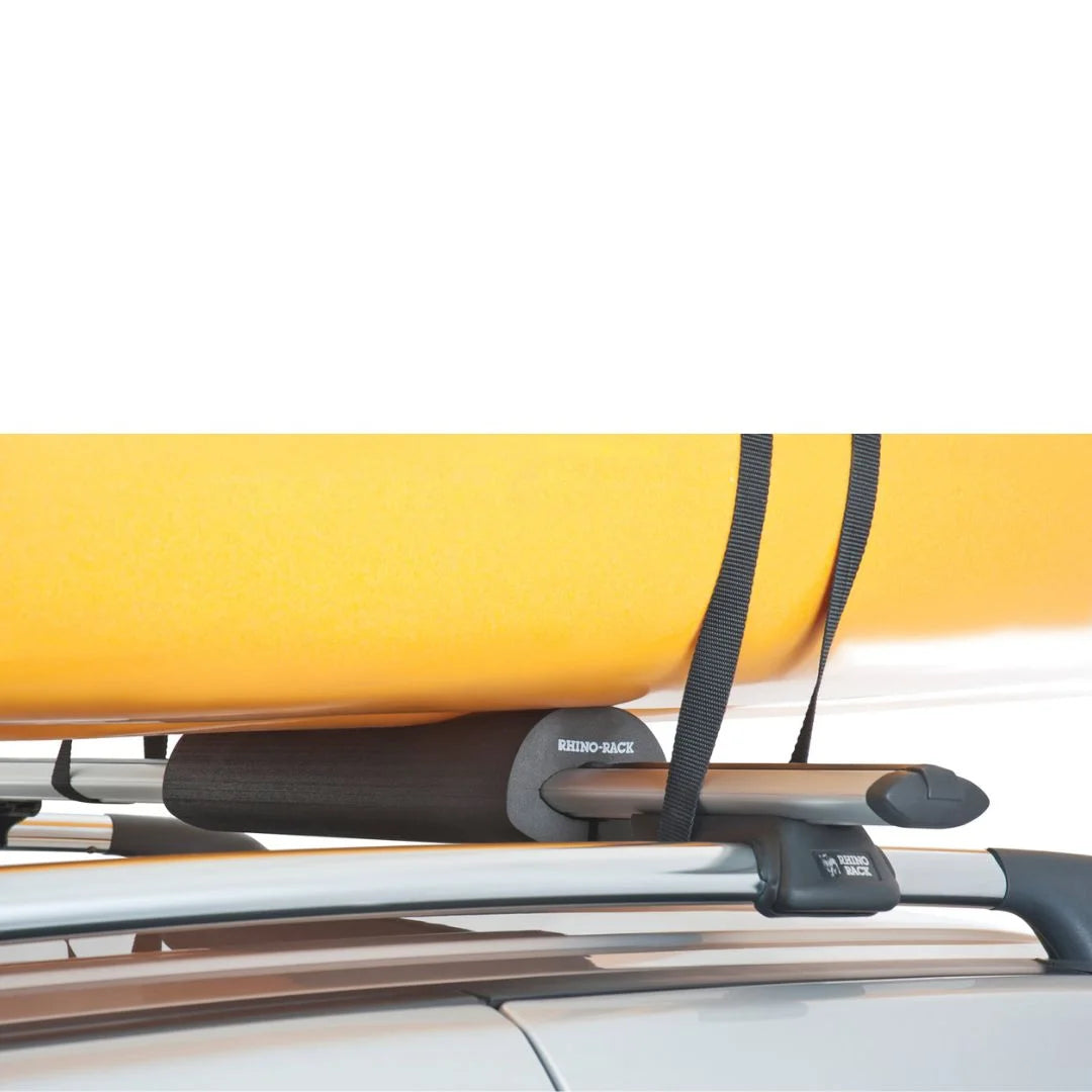 Close-up of Rhino-Rack Vortex Foam Wrap Pad protecting roof rack while carrying yellow kayak