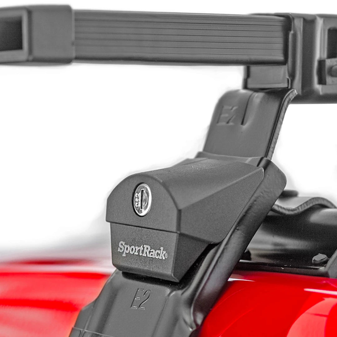 SportRack Flush Roof Rack foot securely clamped onto red vehicle roof rail.