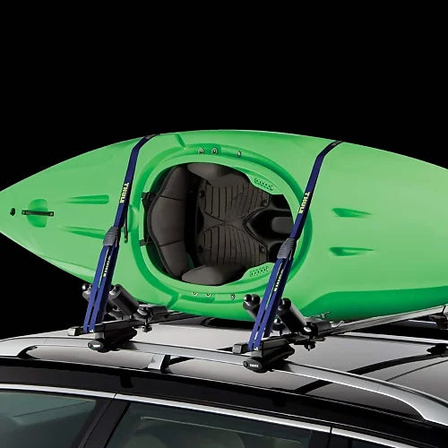 Front view of kayak mounted on Thule Hull-a-Port Pro folding J-cradle roof rack – installed on vehicle crossbars for transport