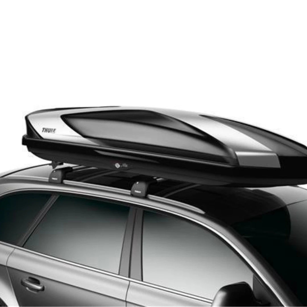 Thule Hyper XL cargo box mounted on a roof rack, viewed from the passenger side.