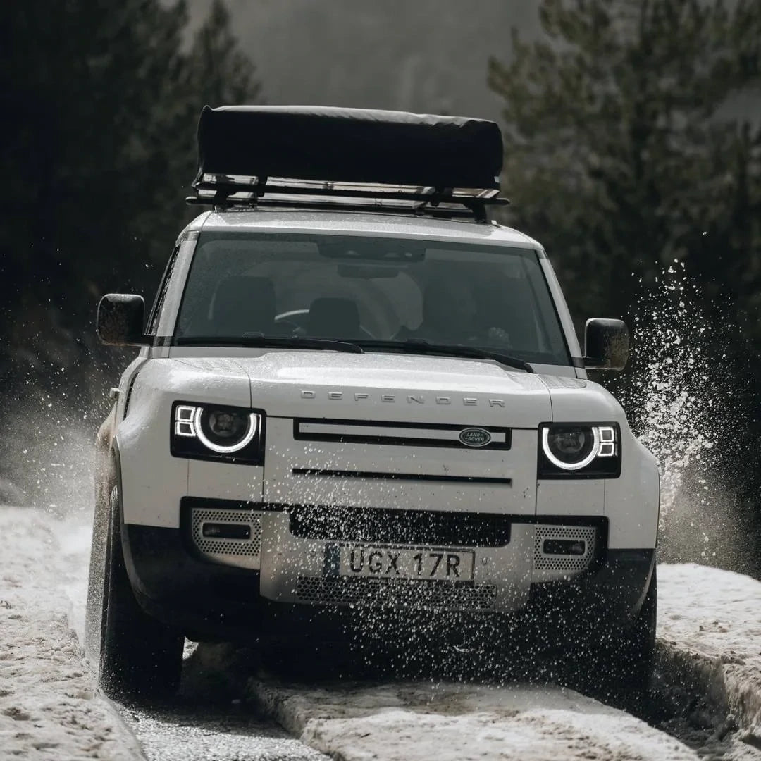 Thule Approach Rooftop Tent
folded on car roof. car driving thru water
