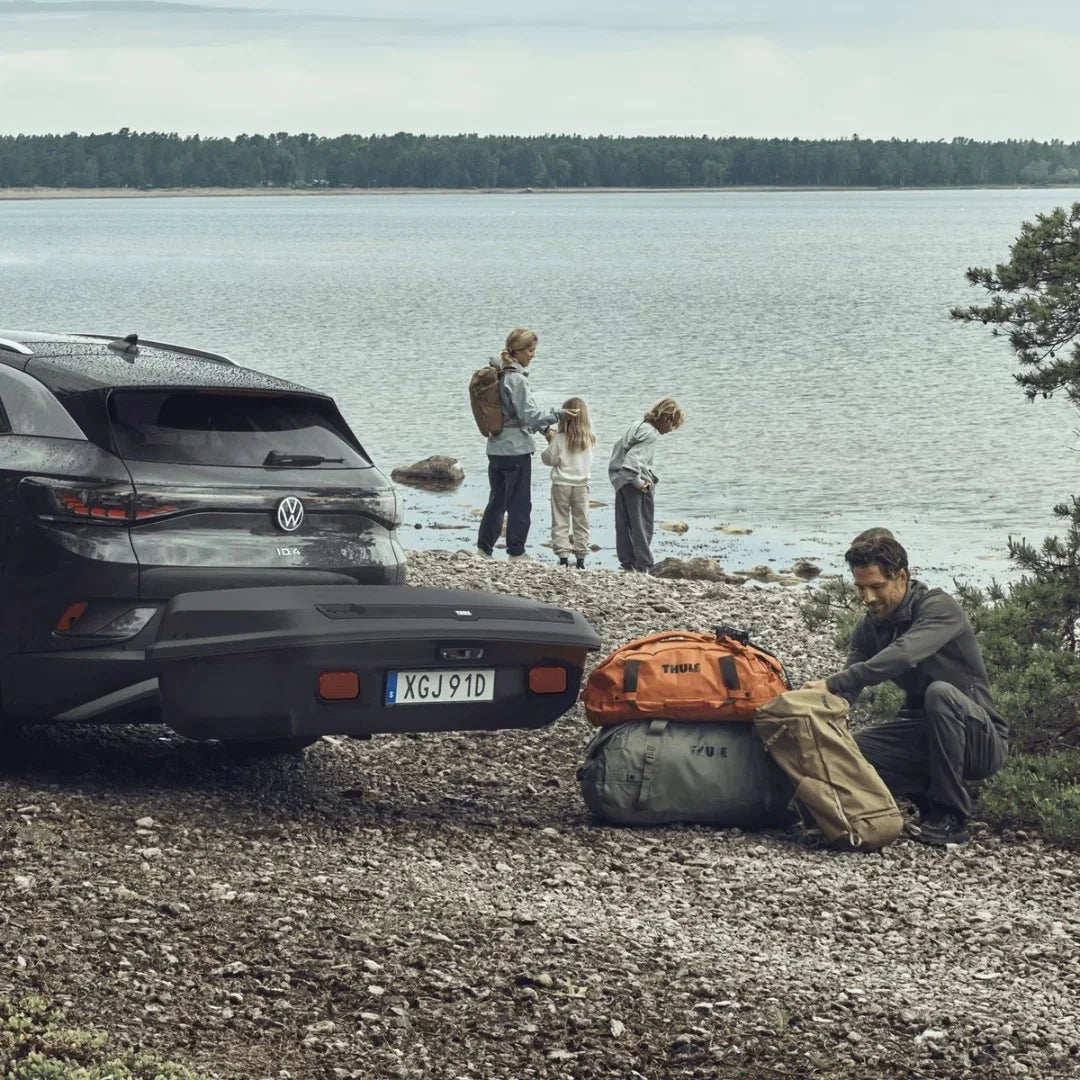 Thule Arcos Box & Platform Bundle installed on black Car. Family camping trip