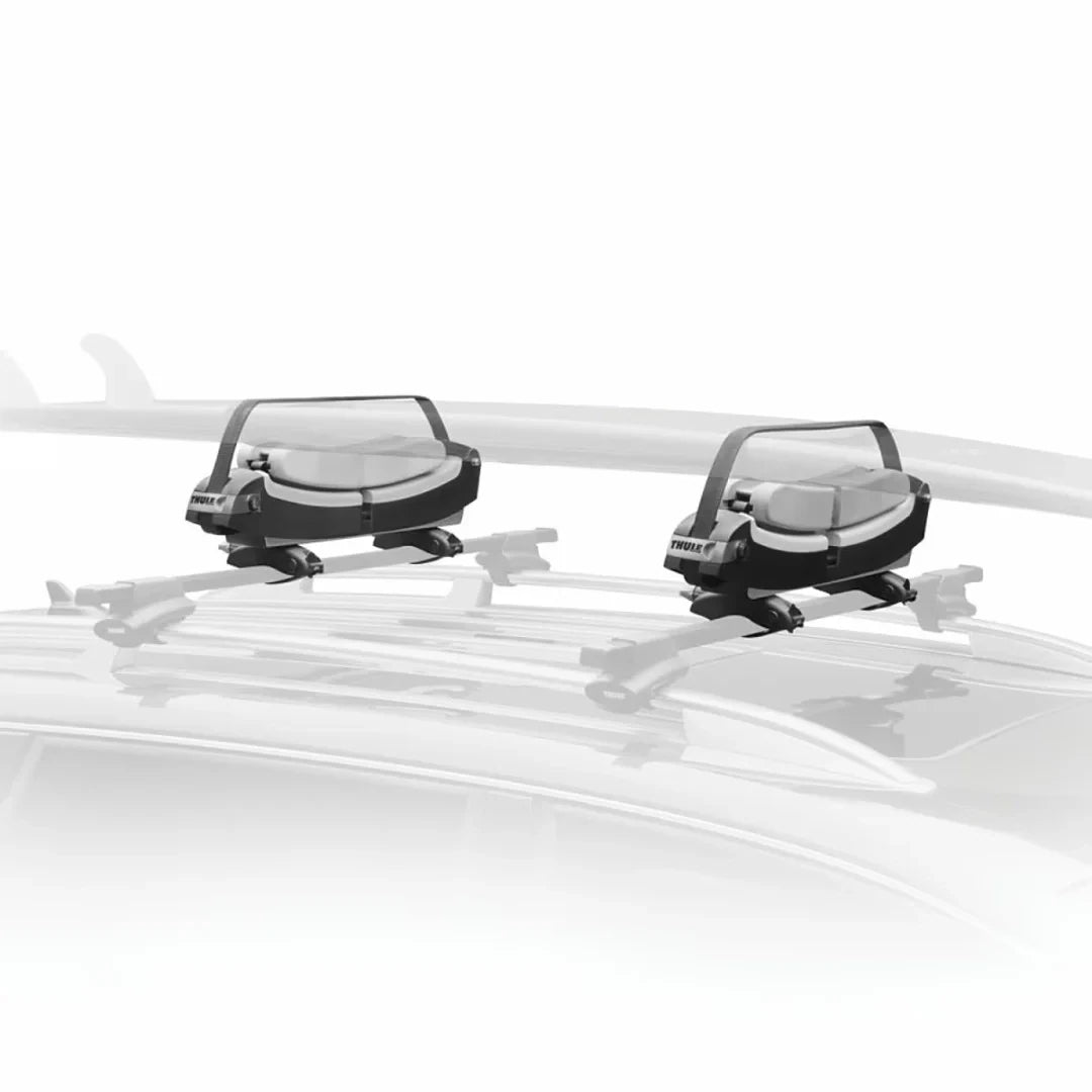 Top view of Thule surfboard carrier installed on a roof rack with dual cradle configuration