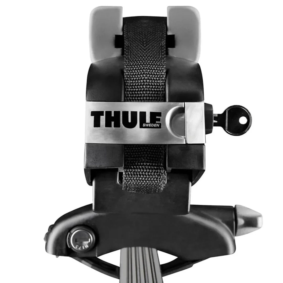 Rear view of Thule surfboard carrier showing locking strap and secure mount
