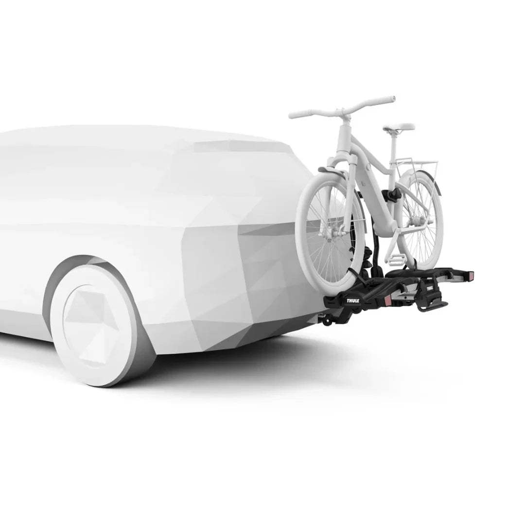 Thule Easyfold XT shown attached to vehicle with bike loaded
