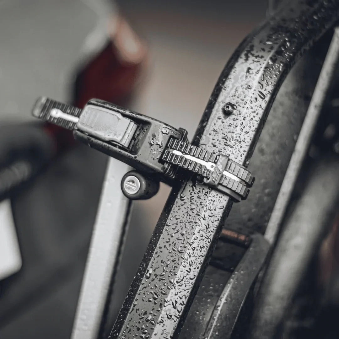 Detail of Thule Epos clamp securing a bike frame