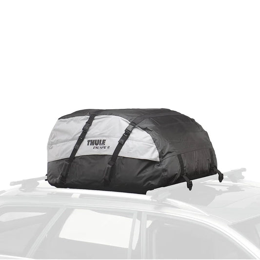Thule Escape II roof cargo bag securely strapped to a vehicle roof rack, shown in black with gray accents
