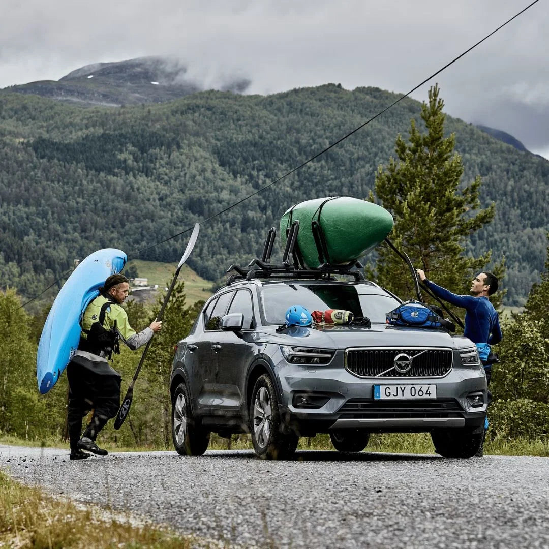 Thule Hull-a-Port XTR Kayak Rack
on car with kayak. People standing next to it