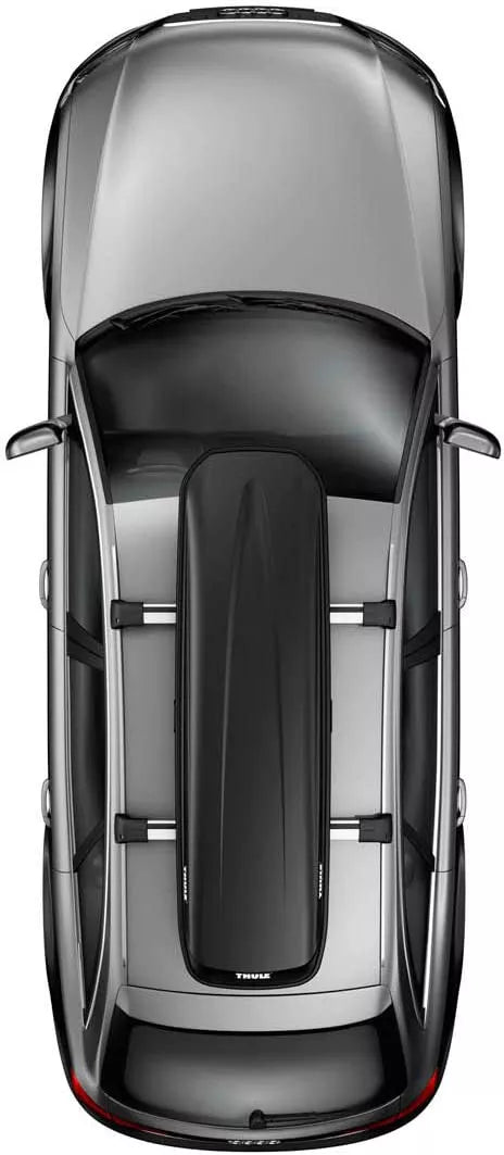 Top-down view of a black Thule Pulse box mounted on a silver vehicle.
