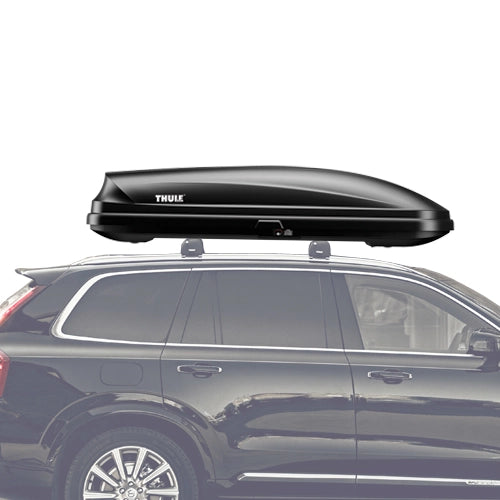 Thule Pulse box mounted on a black SUV viewed from the side.
