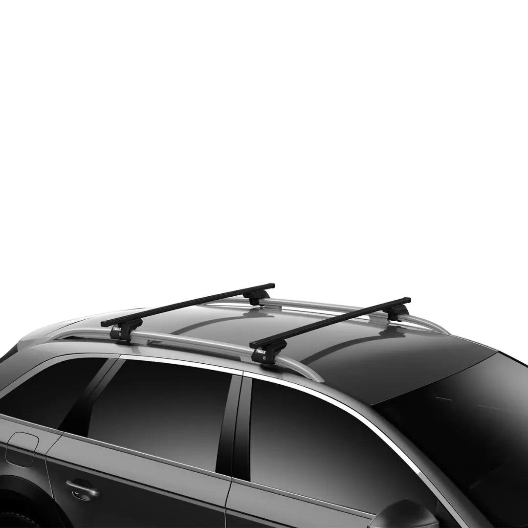 Thule SquareBar Evo crossbars mounted on vehicle roof with raised side rails