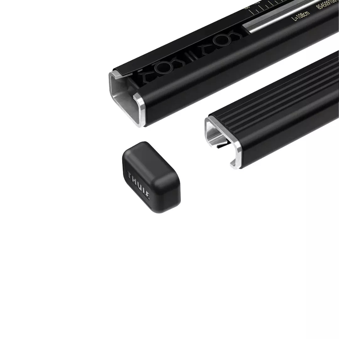 Detailed view of Thule SquareBar Evo bar ends and internal metal structure, with detached end caps