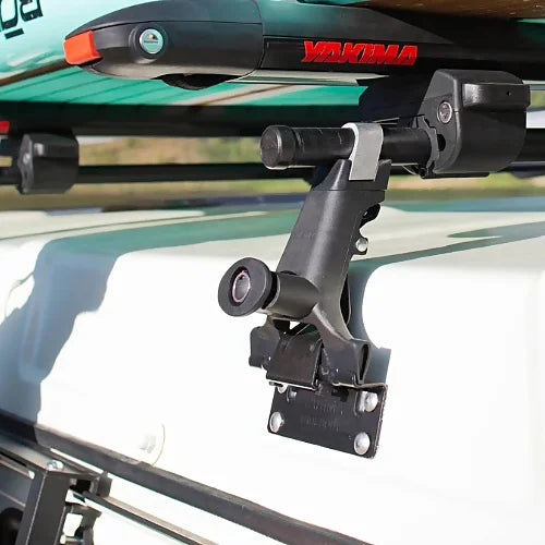 Yakima 1A Raingutter tower close-up with mounted kayak rack on vehicle rooftop
