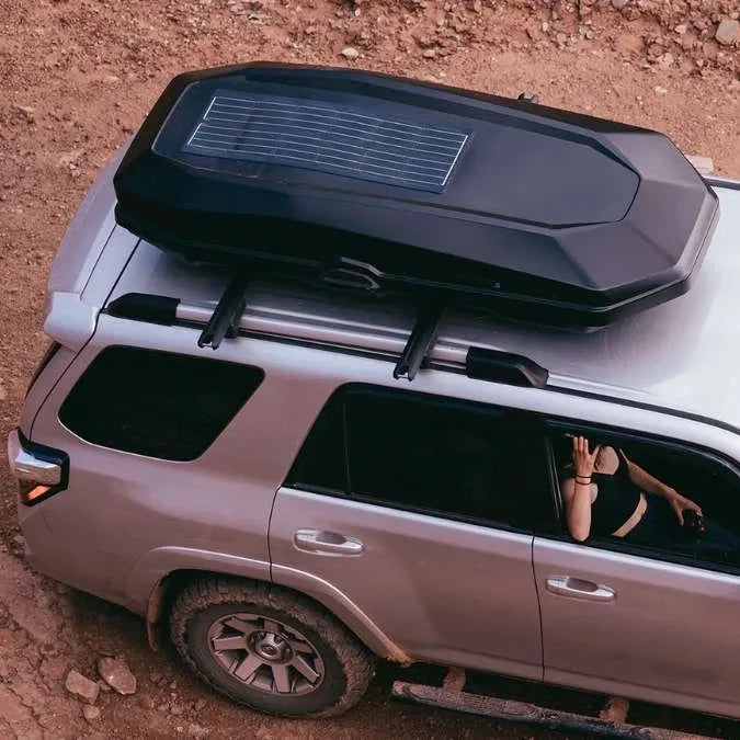 Yakima CBX Solar on top of car driving thru dessert