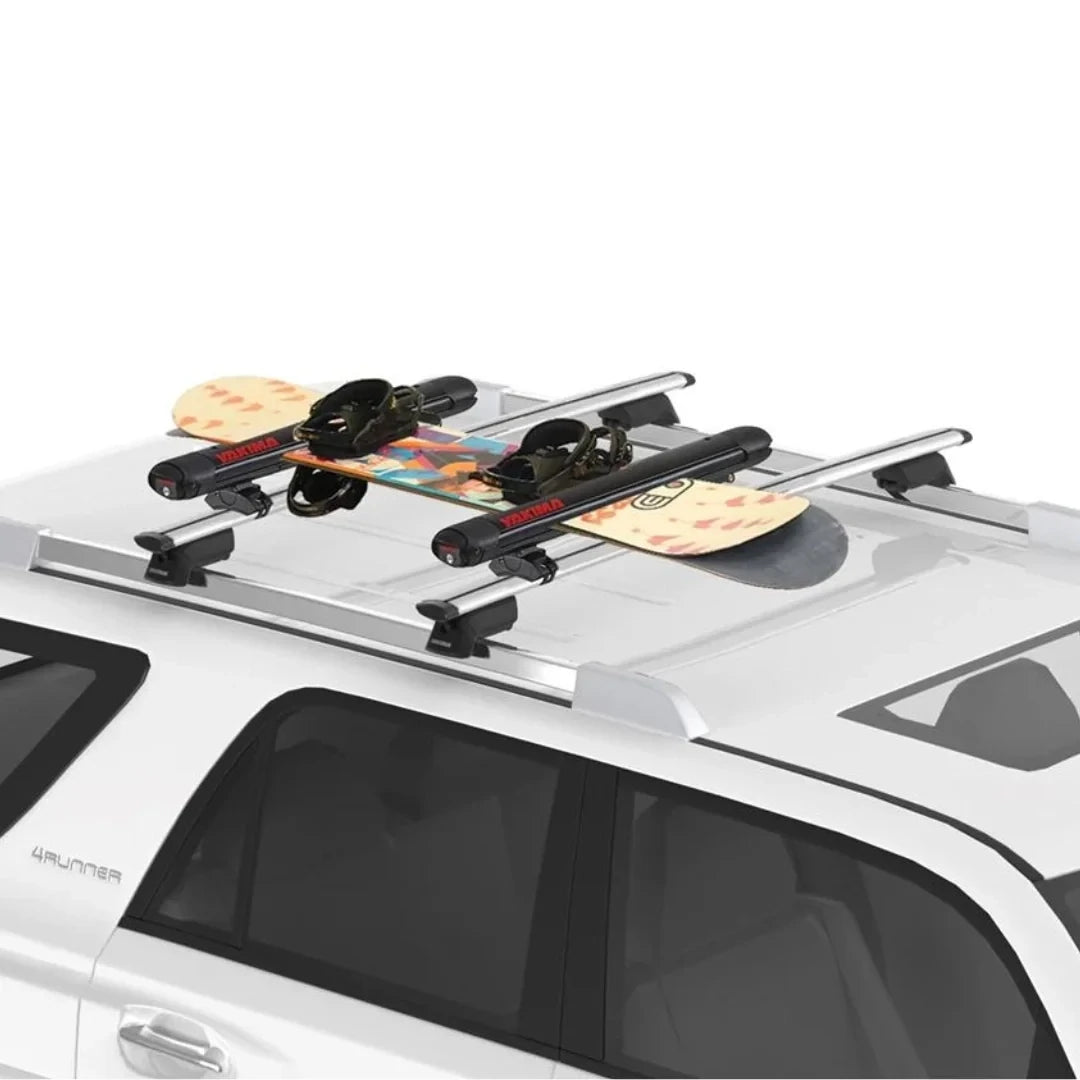 Yakima FatCat Ski & Snowboard Rack with snowboard on car roof