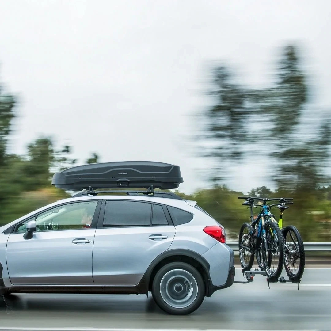 Yakima Skybox NX on top of driving car