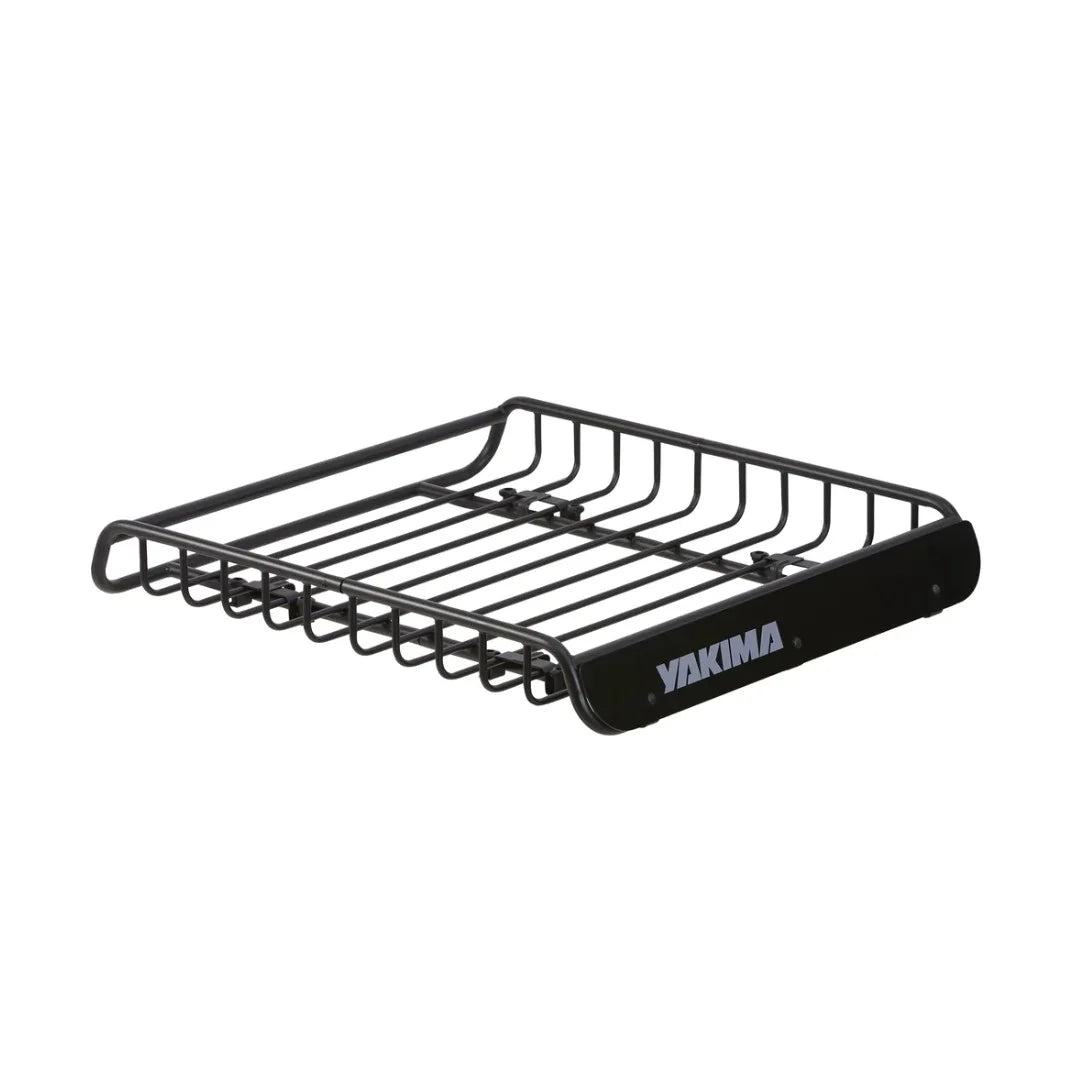 Yakima roof cargo basket in black finish with front wind fairing, empty and side view.