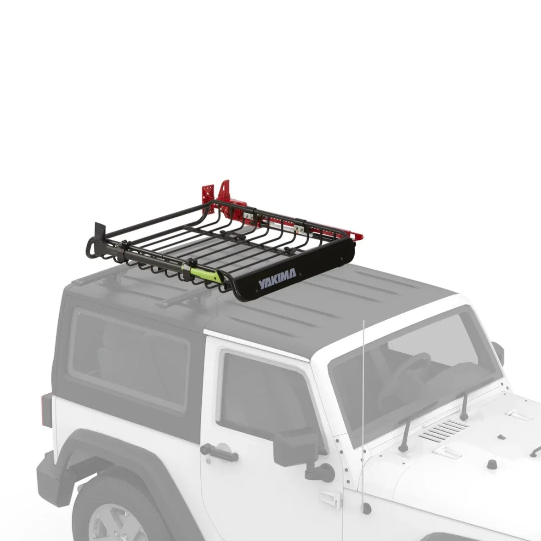 Yakima basket on Jeep roof with added gear and red tools secured on top.