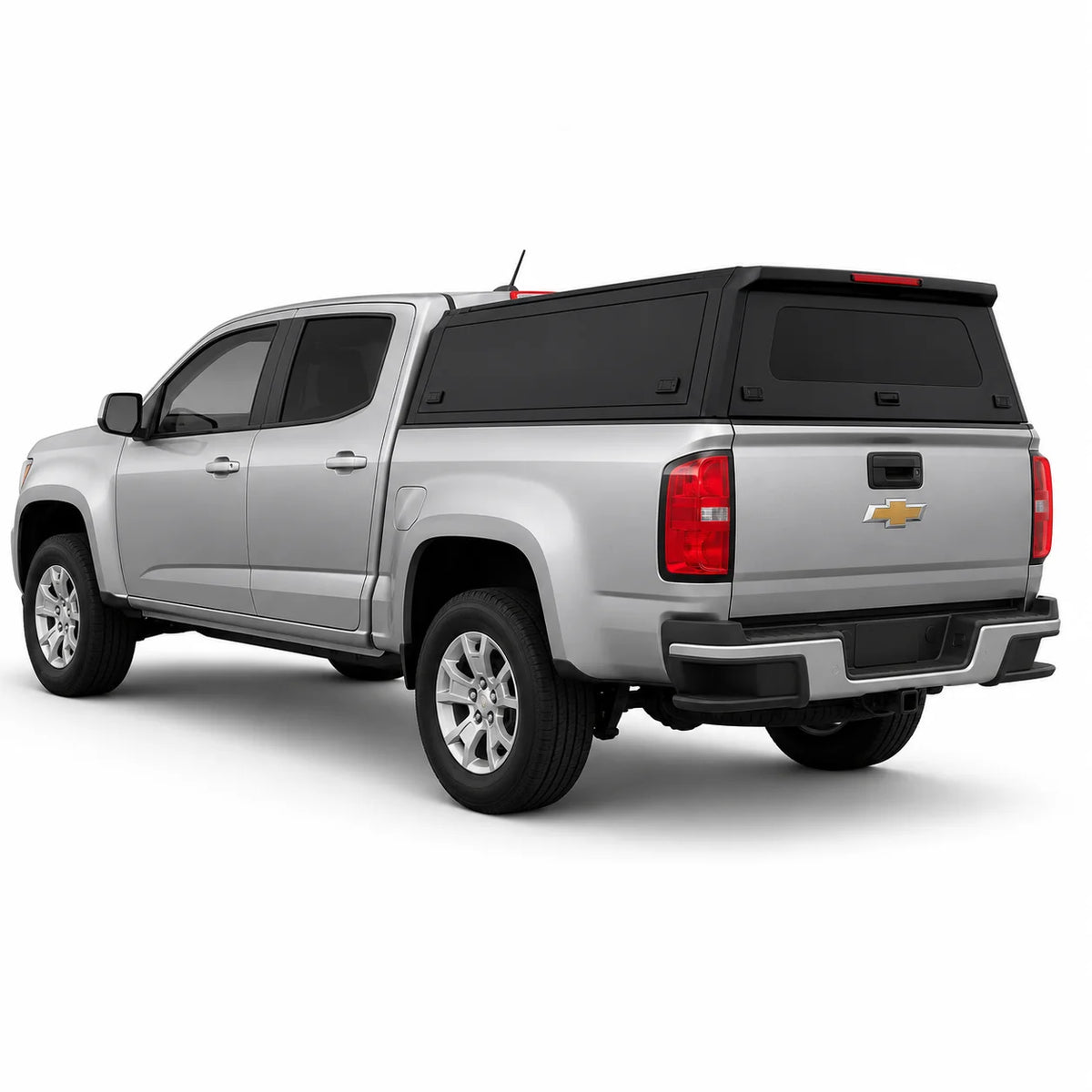 A silver Chevrolet Colorado pickup truck shown from a rear three-quarter angle, fitted with a black hardtop canopy over the bed, on a clean white background.