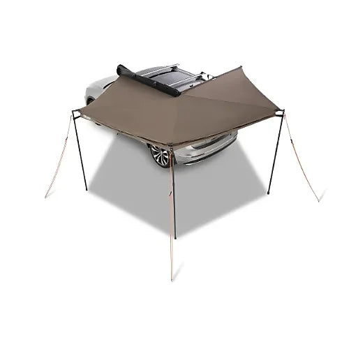 Top-down view of Rhino-Rack Batwing Compact Awning fully deployed around car