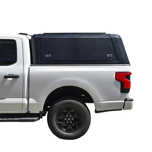 Stainless steel overland canopy side profile for Dodge Ram 1500 (2009–2025) and Ram Classic/Warlock (2019–2024) 5.7' bed, shown on Ford F150 for reference.