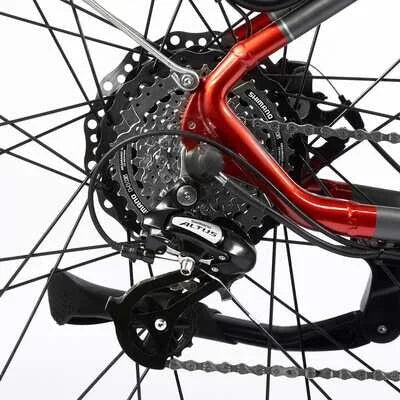 Detailed view of the Shimano Altus derailleur and gear cassette setup.