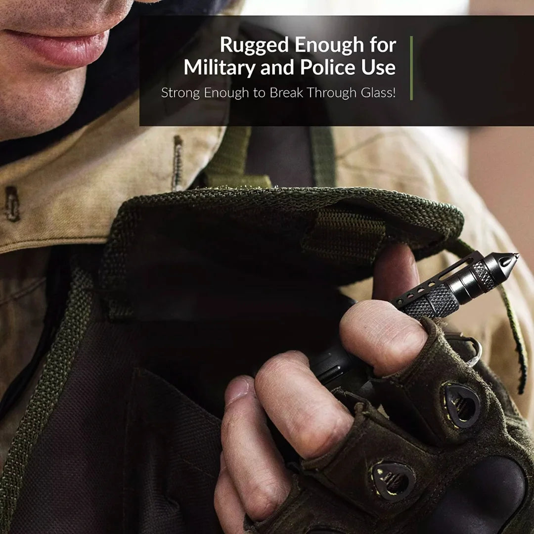 Person holding the tactical pen in a writing position