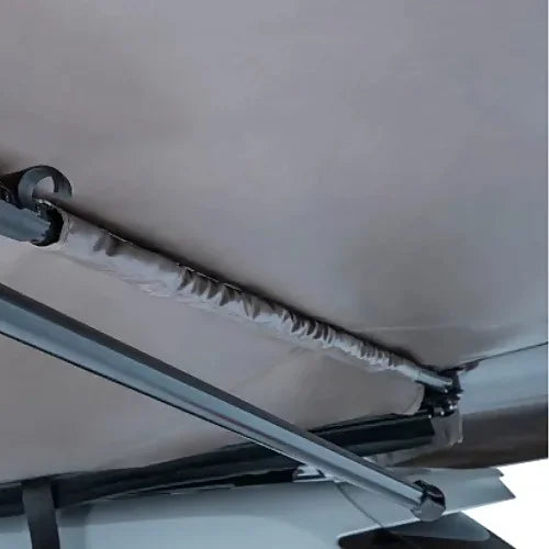 Close-up of internal awning support arms and rolled canvas detail