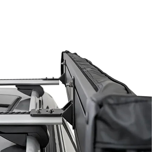 Mounting bracket of Rhino-Rack Batwing Compact Awning securely installed on crossbars