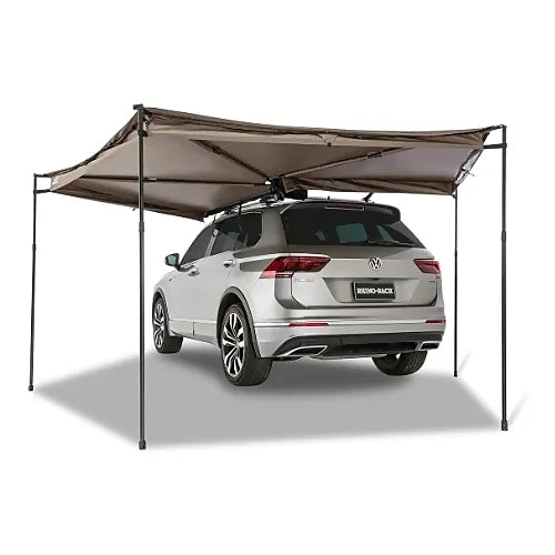 Rhino-Rack Batwing Compact Awning Right Side mounted on SUV offering wide rear coverage