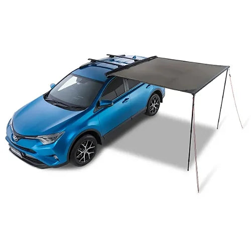 Diagonal front angle of Rhino-Rack 2.0m awning setup on blue SUV