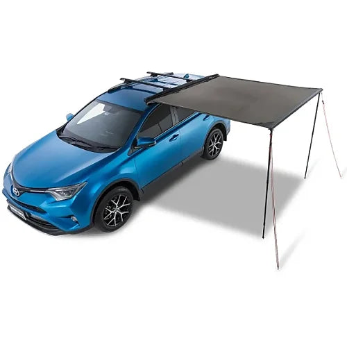 Rhino-Rack Sunseeker 2.0m awning fully extended on blue Toyota SUV