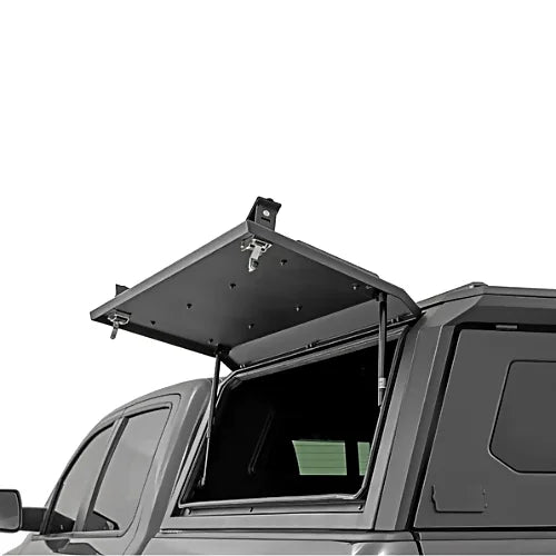 Rough Country overland truck canopy with gullwing side door open for quick pickup bed access