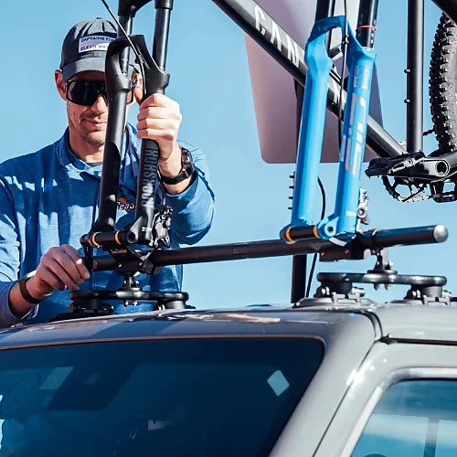 Close-up of SeaSucker Ridge Ready Monkey Bars with bike mount installation on car roof