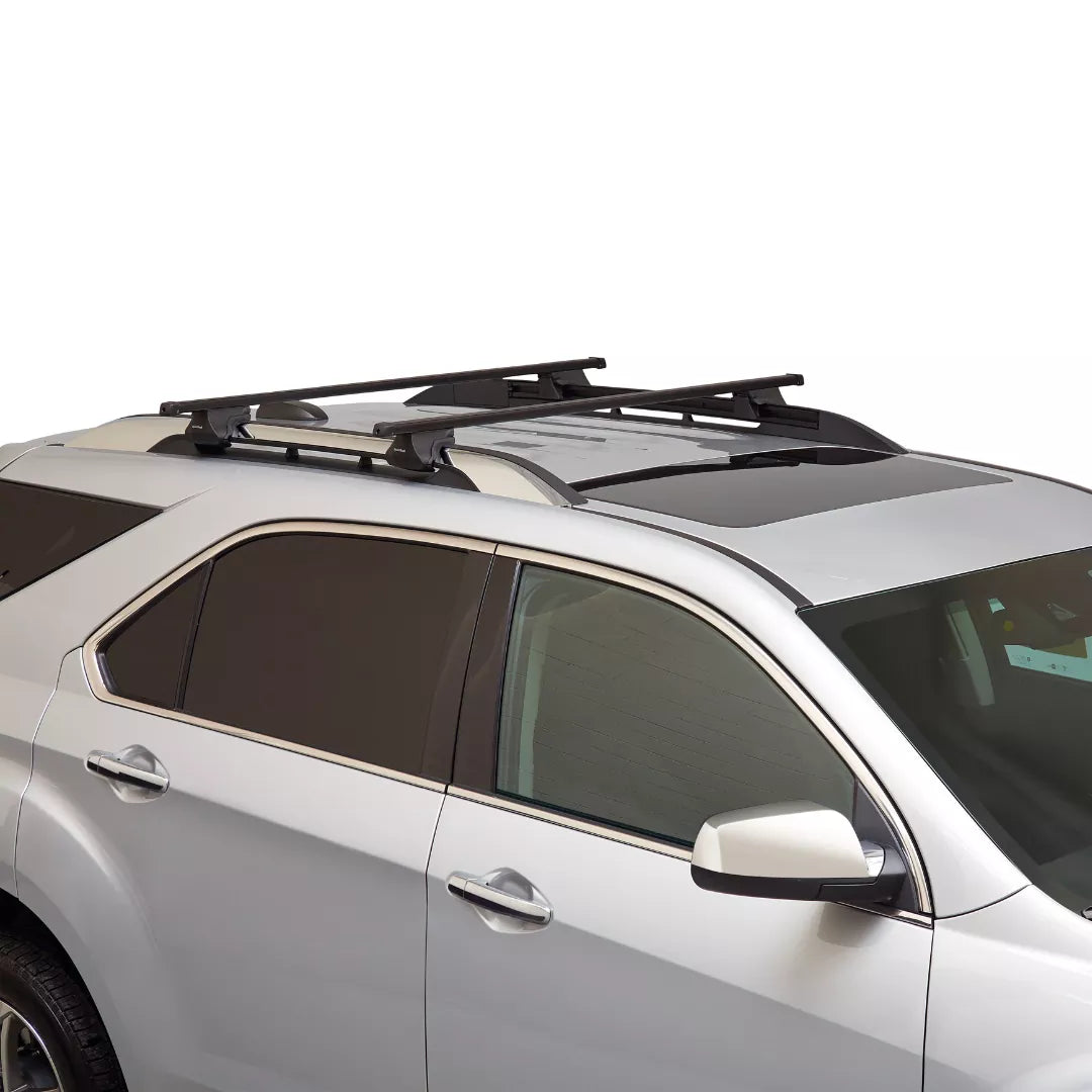 Crossbars installed on a vehicle with raised side rails.