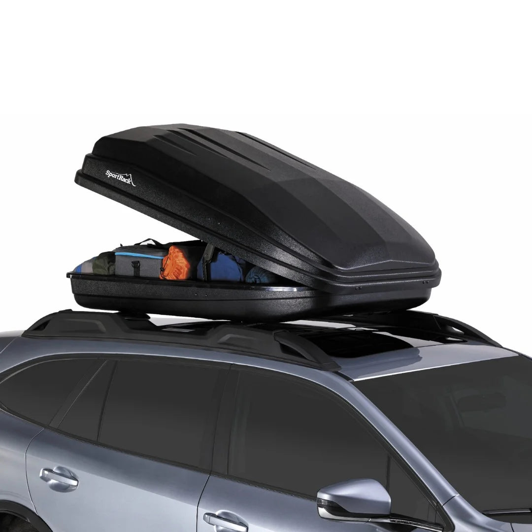 Vista XL cargo box mounted on a vehicle with the lid partially open revealing contents.