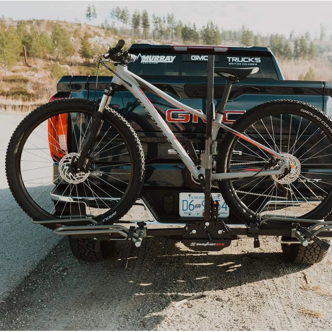 Swagman XTC rack loaded with two bikes mounted on a pickup truck.