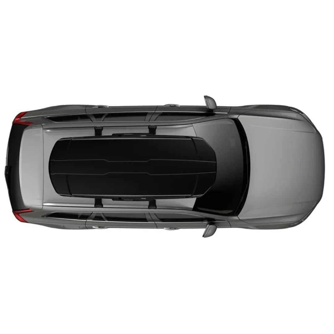 Top-down view of a vehicle with a Thule Motion XT Alpine box mounted on the roof.