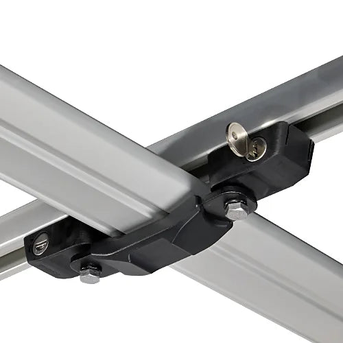 Thule rooftop tent mounting brackets installed on crossbars