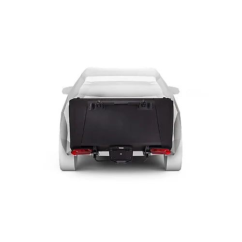 Compact folded Thule Outset Hitch Car Tent in storage position attached to back of vehicle.