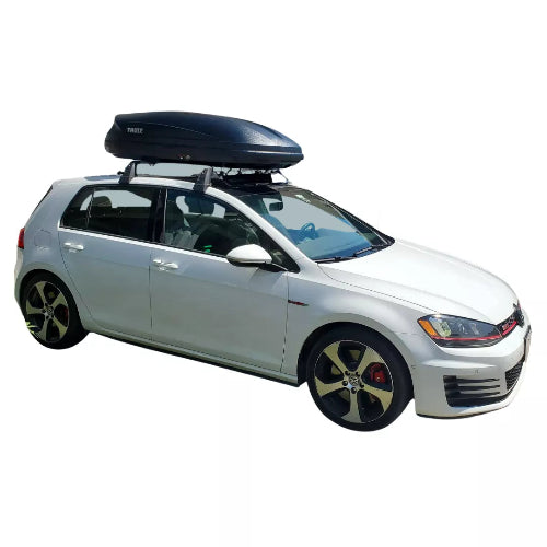 Thule Pulse roof cargo box mounted on white hatchback side view, showing compact aerodynamic design for everyday travel and storage
