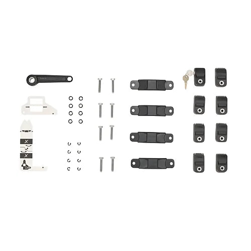 Full Thule rooftop tent mounting kit with locking mechanism and tools